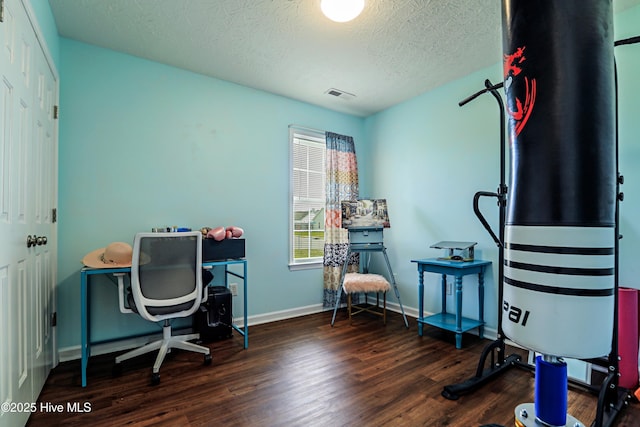 229 Red Carnation Dr, Holly Ridge, NC 28445 - office with wood finished floors, a textured ceiling, and baseboards