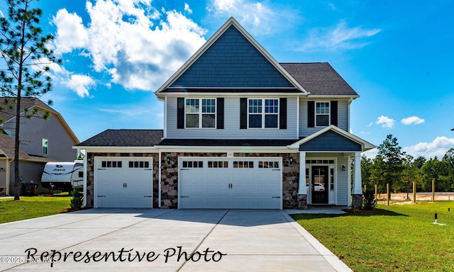 30080 Loblolly Ct, Wagram, NC 28396 - craftsman-style home featuring driveway, a front yard, stone siding, an attached garage, and a shingled roof
