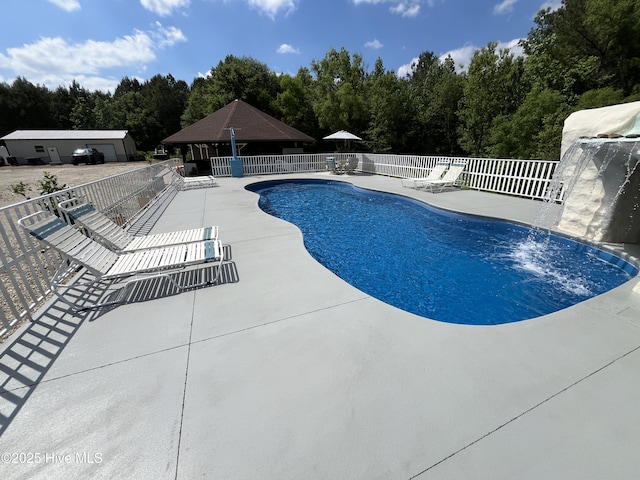 2483 Mcneill Hobbs Rd, Bunnlevel, NC 28323 - view of pool with fence, a patio area, and view of wooded area