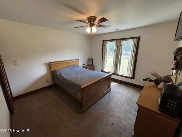 2483 Mcneill Hobbs Rd, Bunnlevel, NC 28323 - carpeted bedroom featuring baseboards and a ceiling fan