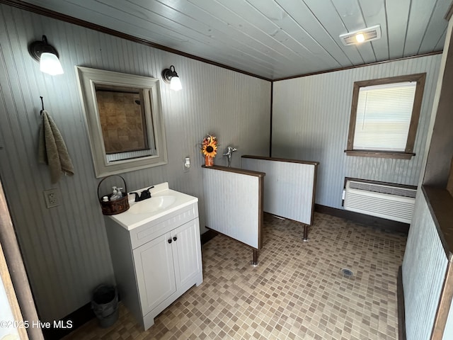 2483 Mcneill Hobbs Rd, Bunnlevel, NC 28323 - bathroom with vanity, brick patterned floors, an AC wall unit, baseboards, and wood walls