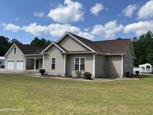 2483 Mcneill Hobbs Rd, Bunnlevel, NC 28323 - view of front of home featuring a front yard and an attached garage