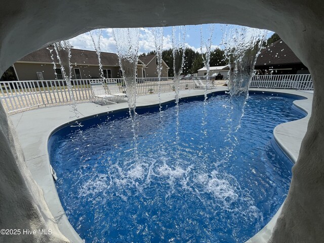 2483 Mcneill Hobbs Rd, Bunnlevel, NC 28323 - view of swimming pool featuring fence and a patio