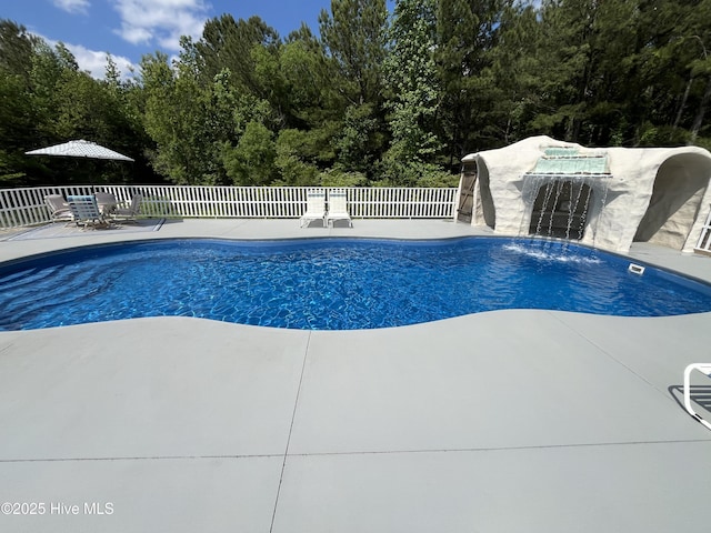 2483 Mcneill Hobbs Rd, Bunnlevel, NC 28323 - view of pool with fence and a patio area