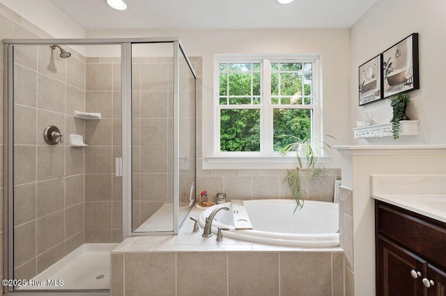 270 Wembley Dr, Clayton, NC 27527 - full bathroom with a shower stall, a bath, vanity, and recessed lighting