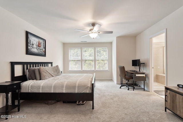 270 Wembley Dr, Clayton, NC 27527 - bedroom featuring carpet, connected bathroom, baseboards, a desk, and a ceiling fan