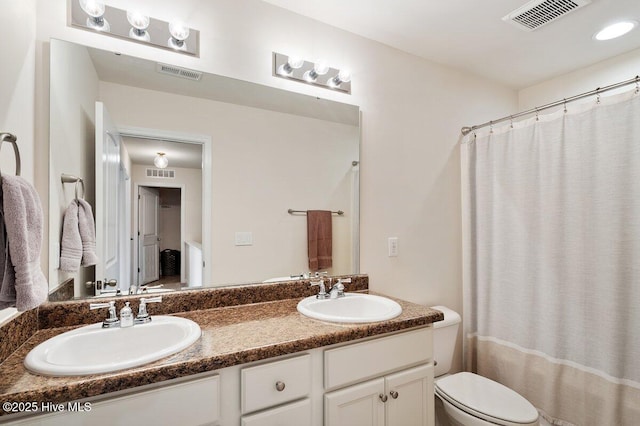 270 Wembley Dr, Clayton, NC 27527 - full bathroom featuring toilet and double vanity