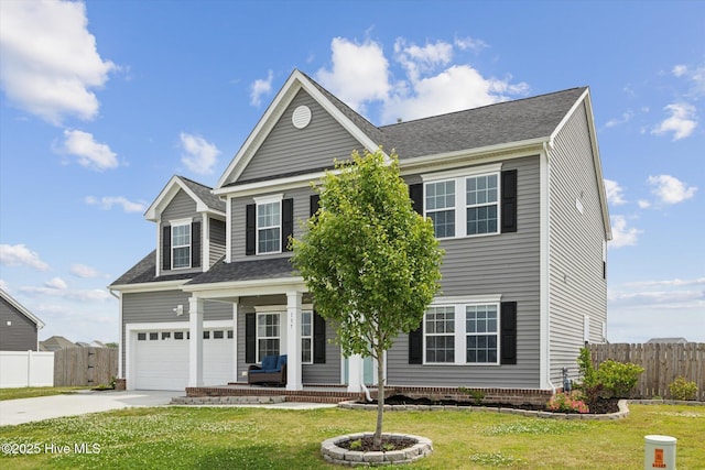 137 Gander Dr, Moyock, NC 27958 - traditional-style home featuring a porch, driveway, an attached garage, and a shingled roof