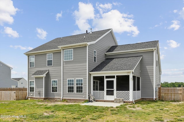 137 Gander Dr, Moyock, NC 27958 - back of house with a sunroom and a shingled roof