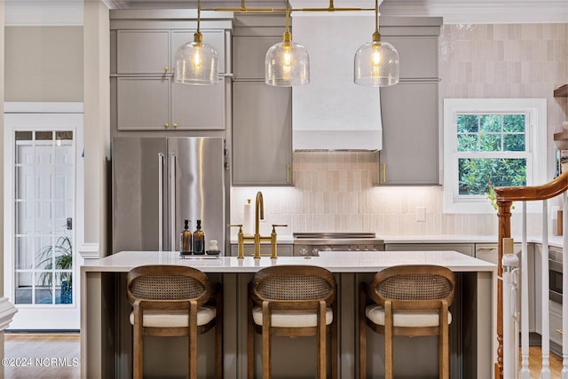 6920 Runningbrook Ter, Wilmington, NC 28411 - kitchen featuring high end fridge, gray cabinets, light countertops, and decorative backsplash