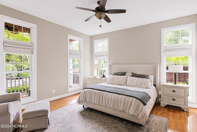6920 Runningbrook Ter, Wilmington, NC 28411 - bedroom with wood finished floors, baseboards, and a ceiling fan