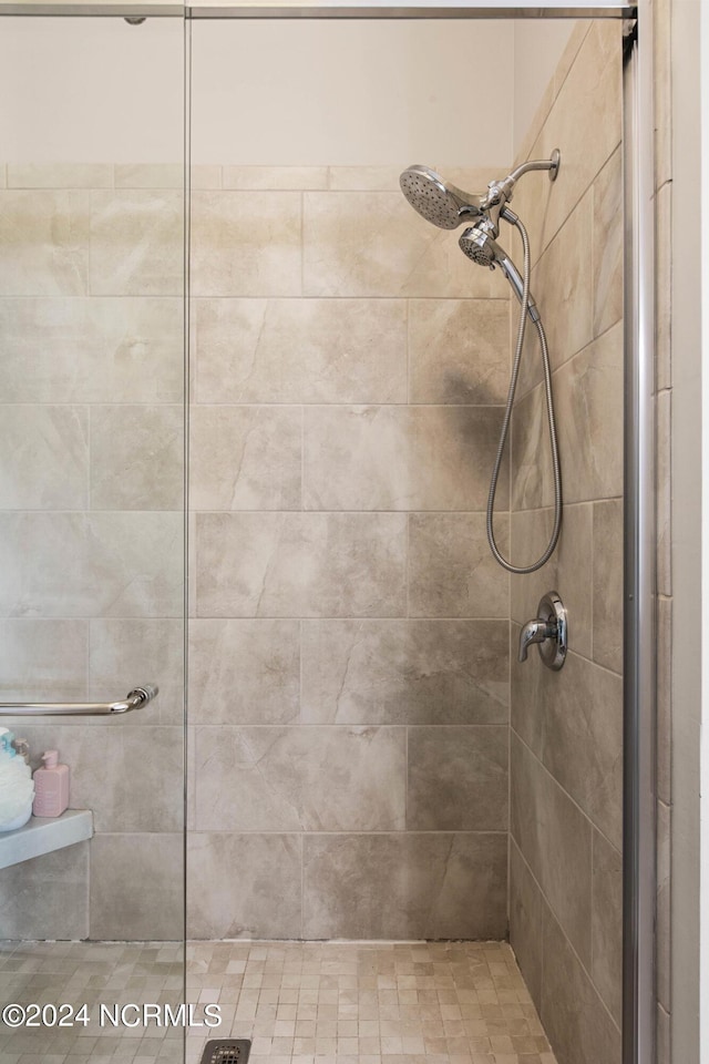 6920 Runningbrook Ter, Wilmington, NC 28411 - full bathroom with tiled shower