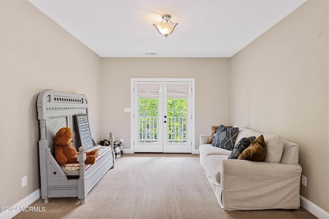 6920 Runningbrook Ter, Wilmington, NC 28411 - sitting room featuring carpet floors, baseboards, and french doors