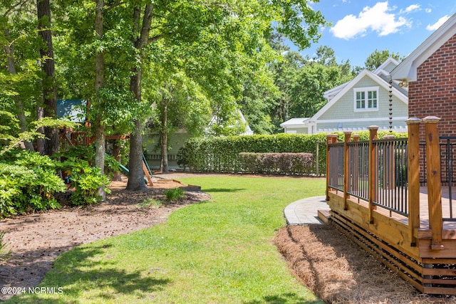 6920 Runningbrook Ter, Wilmington, NC 28411 - view of yard featuring a wooden deck