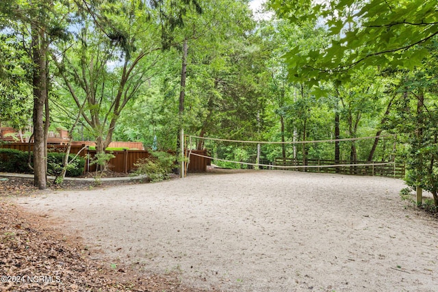 6920 Runningbrook Ter, Wilmington, NC 28411 - surrounding community featuring volleyball court and fence