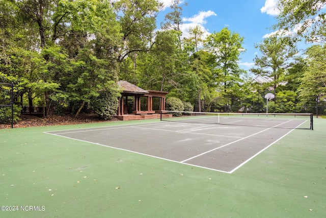6920 Runningbrook Ter, Wilmington, NC 28411 - view of tennis court with community basketball court, a gazebo, fence, and view of wooded area