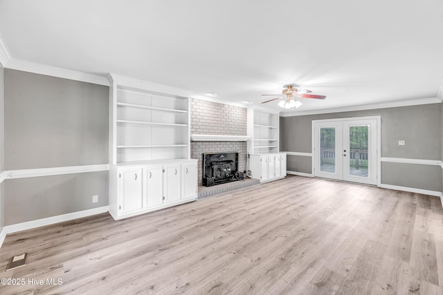 103 E Raintree Ln, Goldsboro, NC 27534 - unfurnished living room with ornamental molding, french doors, a ceiling fan, light wood-style floors, and baseboards