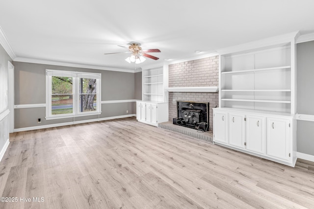 103 E Raintree Ln, Goldsboro, NC 27534 - unfurnished living room featuring baseboards, a ceiling fan, built in features, light wood-style floors, and ornamental molding