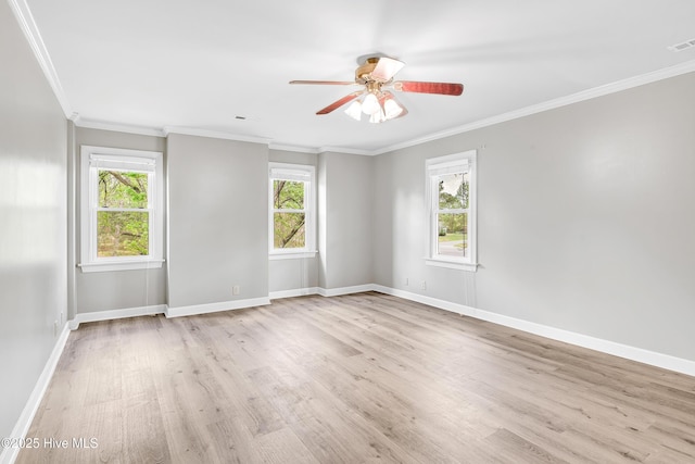 103 E Raintree Ln, Goldsboro, NC 27534 - empty room with plenty of natural light, light wood-style flooring, ceiling fan, ornamental molding, and baseboards