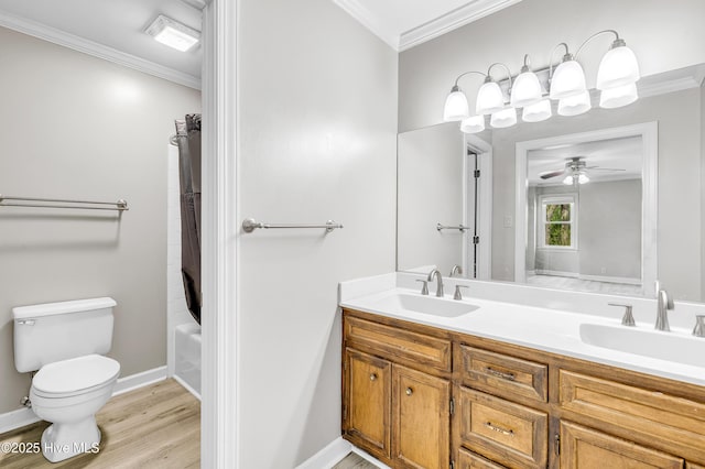 103 E Raintree Ln, Goldsboro, NC 27534 - full bathroom with toilet, ornamental molding, a ceiling fan, double vanity, and wood finished floors