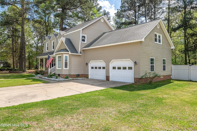103 E Raintree Ln, Goldsboro, NC 27534 - traditional-style house featuring a garage, driveway, a shingled roof, and crawl space