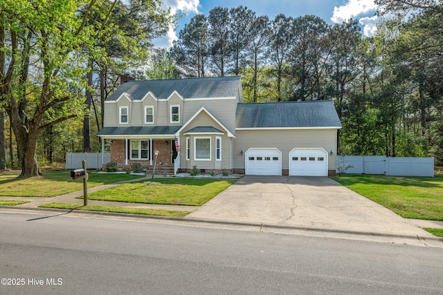 103 E Raintree Ln, Goldsboro, NC 27534 - traditional home featuring an attached garage, concrete driveway, covered porch, and crawl space