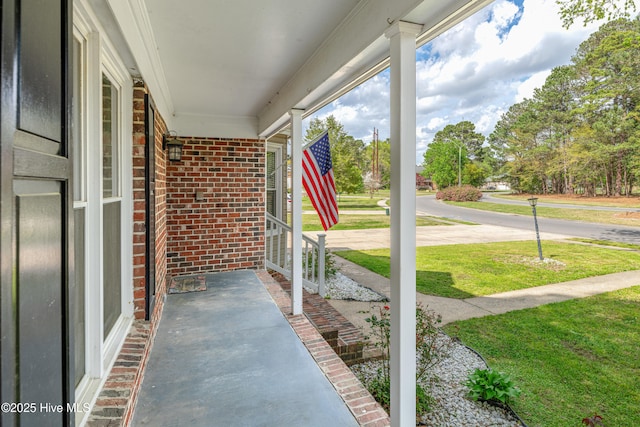 103 E Raintree Ln, Goldsboro, NC 27534 - view of patio featuring a porch