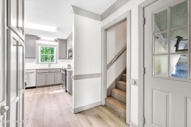 103 E Raintree Ln, Goldsboro, NC 27534 - stairway with wood finished floors and ornamental molding