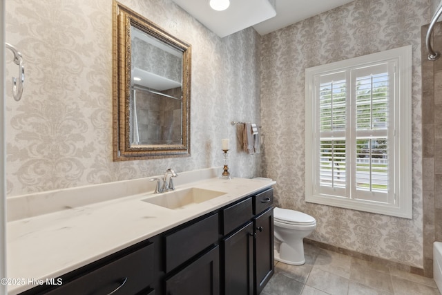 full bath with toilet, vanity, tile patterned floors, a shower, and baseboards