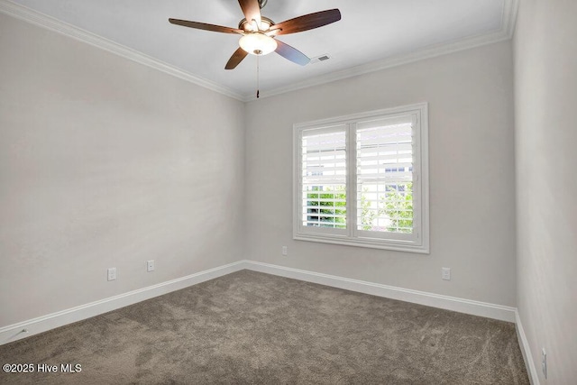 empty room featuring carpet flooring, baseboards, a ceiling fan, and crown molding