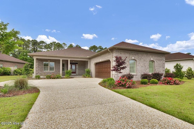 ranch-style house with an attached garage, a front yard, concrete driveway, and brick siding