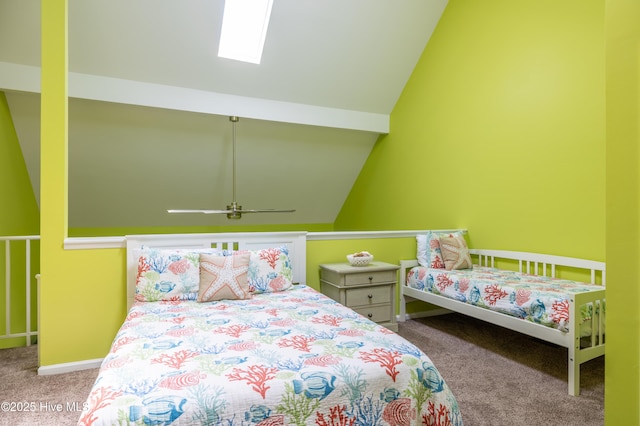 carpeted bedroom featuring vaulted ceiling and baseboards