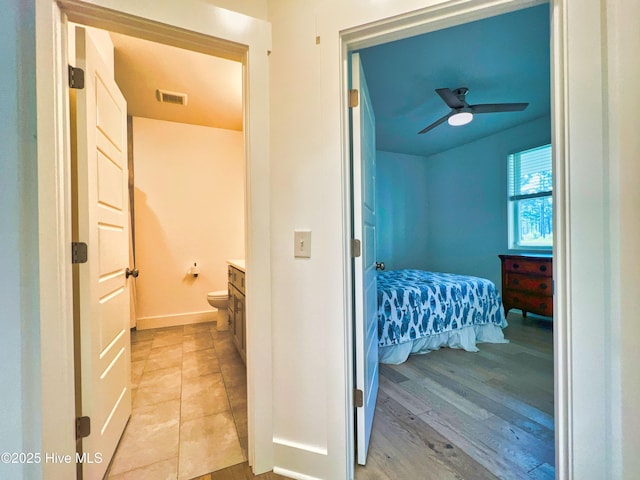 hallway featuring light wood-style floors
