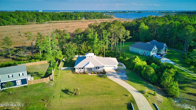 view of subject property with a nearby body of water