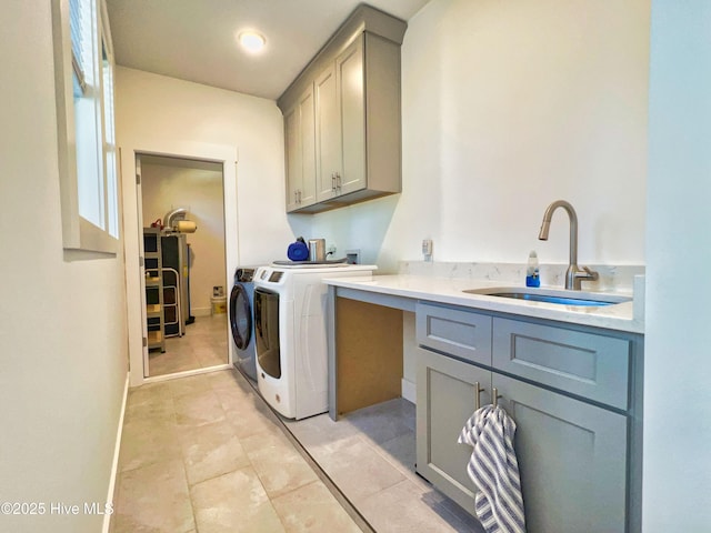 laundry room featuring cabinet space and washing machine and clothes dryer