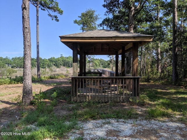 view of yard featuring a gazebo and a deck