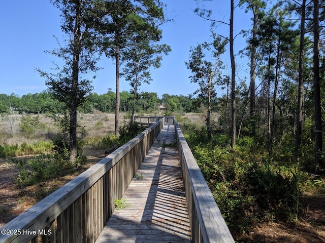 view of property's community with a view of trees