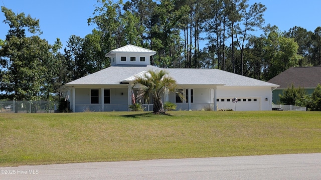 view of front of house with an attached garage and a porch