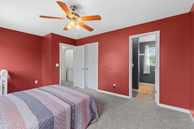 carpeted bedroom with baseboards, ceiling fan, and a closet