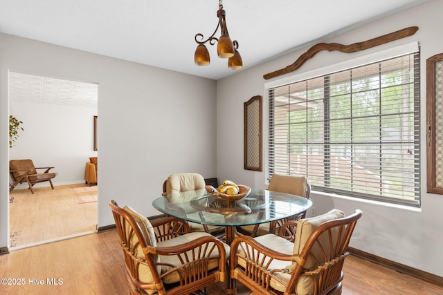 45 Fairway Dr, Shallotte, NC 28470 - dining room featuring plenty of natural light, light wood finished floors, and baseboards