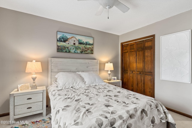 45 Fairway Dr, Shallotte, NC 28470 - carpeted bedroom with a closet, baseboards, and a ceiling fan