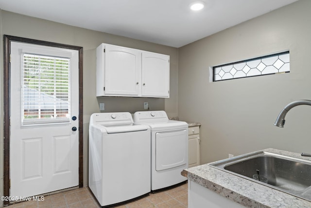45 Fairway Dr, Shallotte, NC 28470 - clothes washing area with cabinet space, independent washer and dryer, and light tile patterned floors