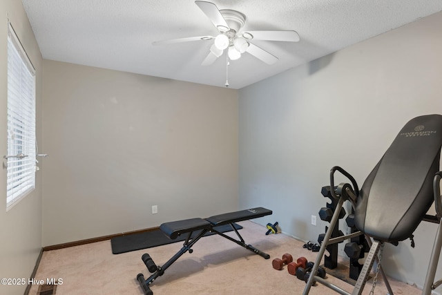 45 Fairway Dr, Shallotte, NC 28470 - workout area featuring a ceiling fan, carpet floors, a textured ceiling, and baseboards
