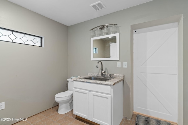 45 Fairway Dr, Shallotte, NC 28470 - half bath with toilet, vanity, and tile patterned floors