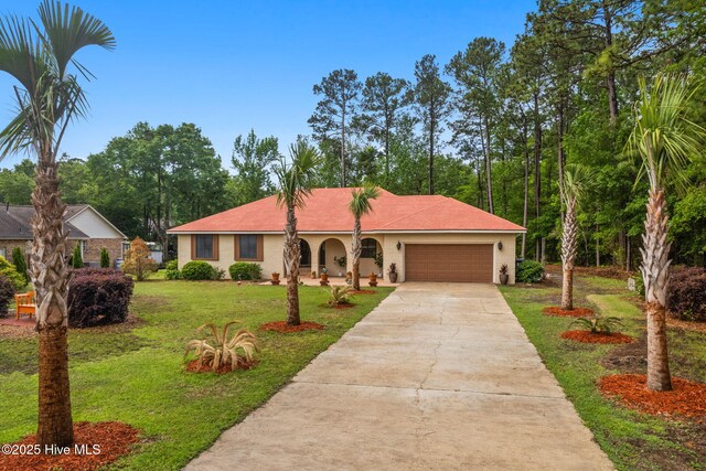45 Fairway Dr, Shallotte, NC 28470 - aerial view of residential area with a forest