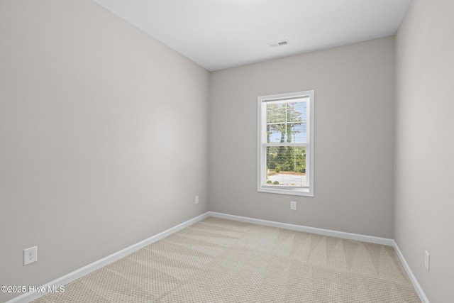 254 Great Egret Way, Beaufort, NC 28516 - empty room with light carpet and baseboards