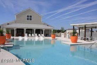 254 Great Egret Way, Beaufort, NC 28516 - community pool featuring an outbuilding and a patio area