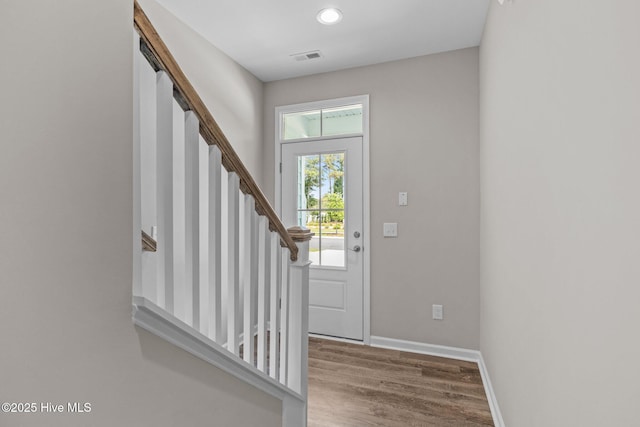 254 Great Egret Way, Beaufort, NC 28516 - entryway featuring stairs, wood finished floors, baseboards, and recessed lighting