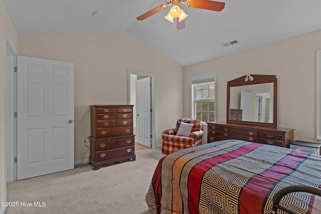 4979 Montserrat Dr, Southport, NC 28461 - carpeted bedroom featuring lofted ceiling and a ceiling fan