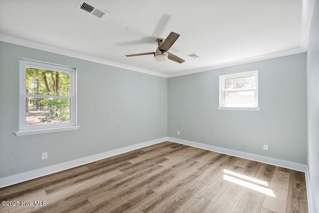 1324 S Shore Dr, Southport, NC 28461 - empty room with ornamental molding, a ceiling fan, wood finished floors, and baseboards
